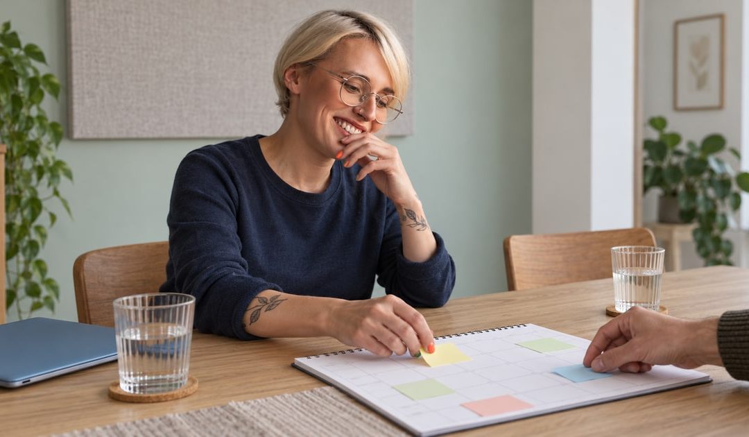An illustrative partner contributing to a shared weekly plan with another person at home.